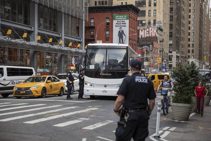 A bus carrying asylum seekers from Texas arrives at the Port Authority in Manhattan.